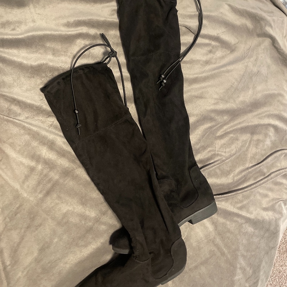 Tall black boots